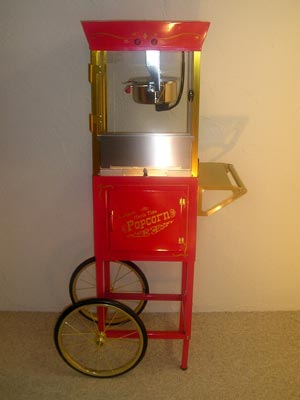 Popcorn Machine..includes 9 - 8oz. bags of Popcorn to Pop...and 50 Popcorn Bags.