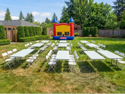Bounce House + 10 Tables + 70 Chairs