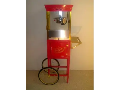 Popcorn Machine..includes 9 - 8oz. bags of Popcorn to Pop...and 50 Popcorn Bags.