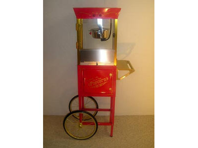 Popcorn Machine..includes 9 - 8oz. bags of Popcorn to Pop...and 50 Popcorn Bags.