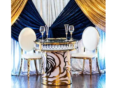 DRAMATIC ROUND GOLD/ WHITE AND CRYSTAL CAKE TABLE WITH GLASS TOP, IT CAN BE USED AS A SWEETHEART TABLES.