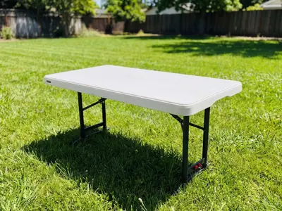 White Kid Tables
