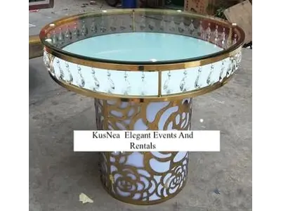 DRAMATIC ROUND GOLD/ WHITE AND CRYSTAL CAKE TABLE WITH GLASS TOP, IT CAN BE USED AS A SWEETHEART TABLES.