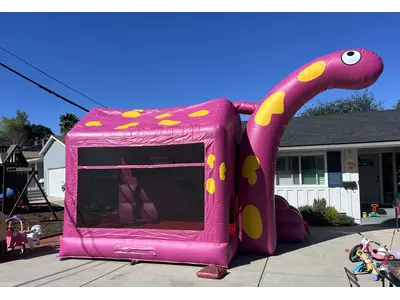 Pink Dinosaur Bounce House Slide in La Mesa